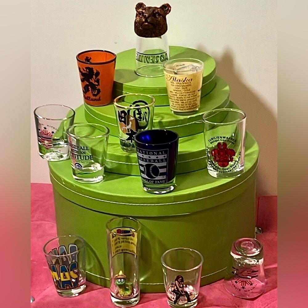 Set of 12 shot glasses Collected various places around the World